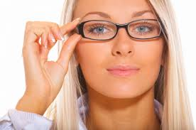 girl-putting-on-glasses-and-makeup.jpg