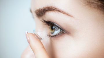 Guide to Wearing Contact Lenses During COVID-19 women-putting-contact-lenses-in-eye