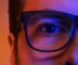 blue light man wearing glasses
