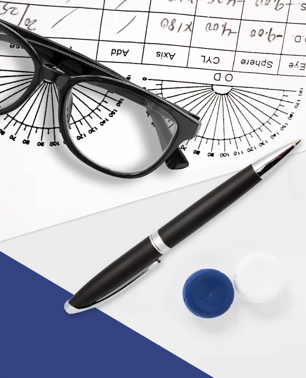 Black framed glasses, a black pen, and a blue-and-white contact-lens case resting on an eyeglass prescription form and pupilometer diagram, shot from above.