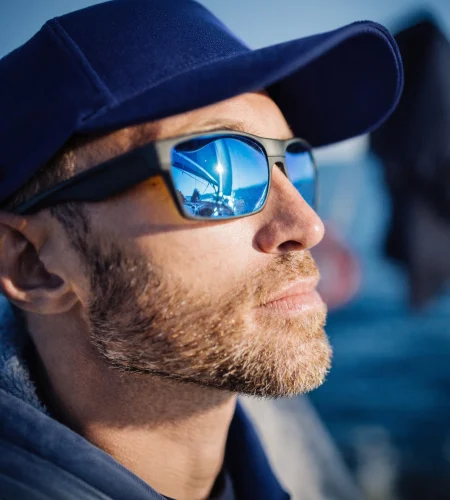 Polarized vs Mirrored vs Photochromic: Picking Sunglass Lenses for Driving, Sports, and Snow