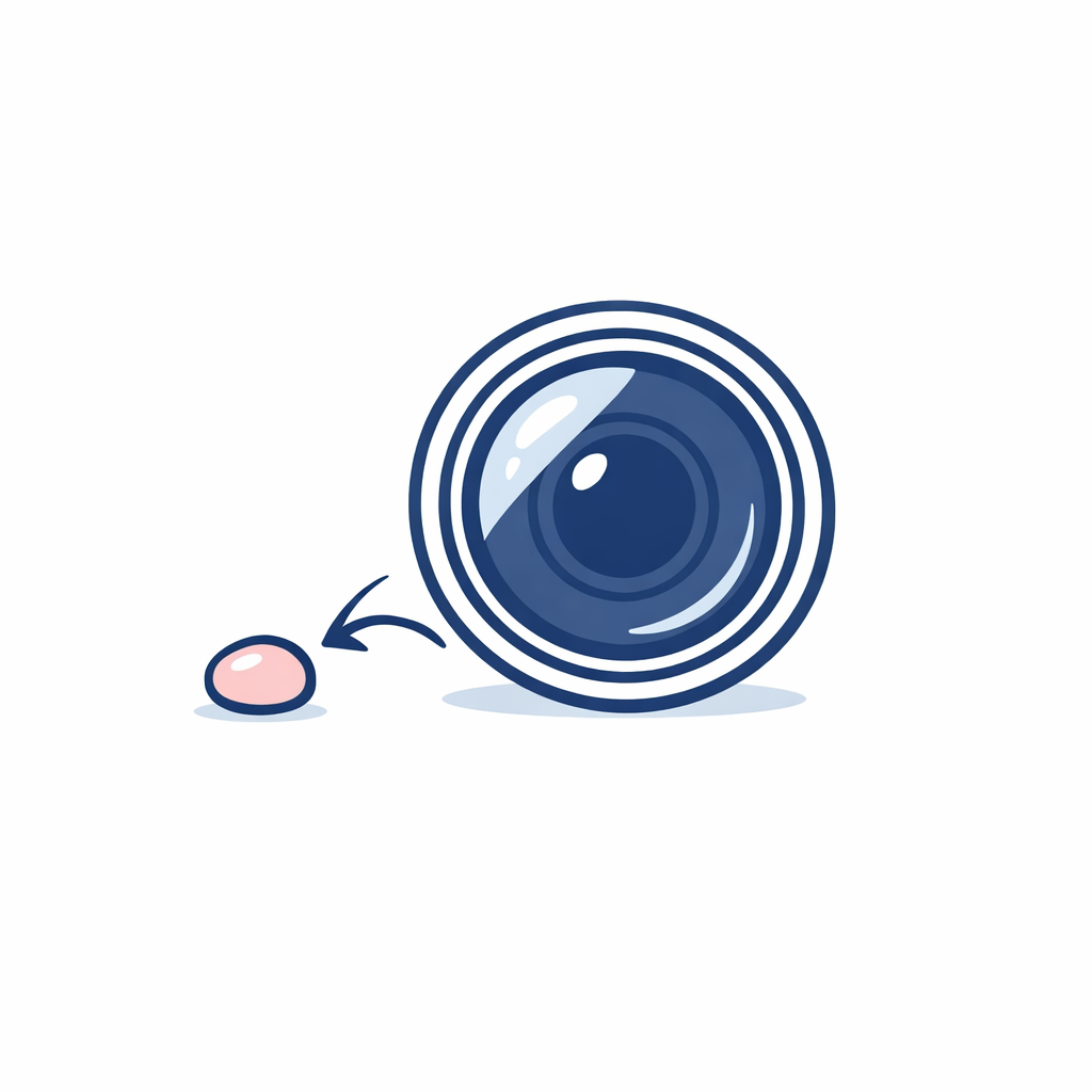 Minimal diagram of a small pebble striking a lens to show durability focus without safety claims.